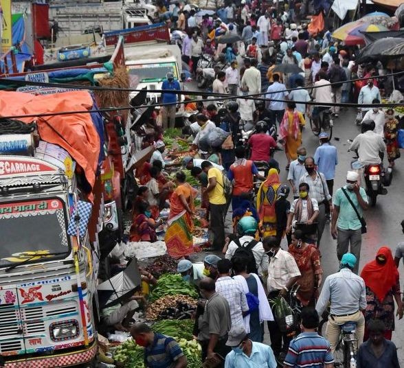 People throng a vegetable market in Kolkata. Photograph: Utpal Sarkar/ANI Photo